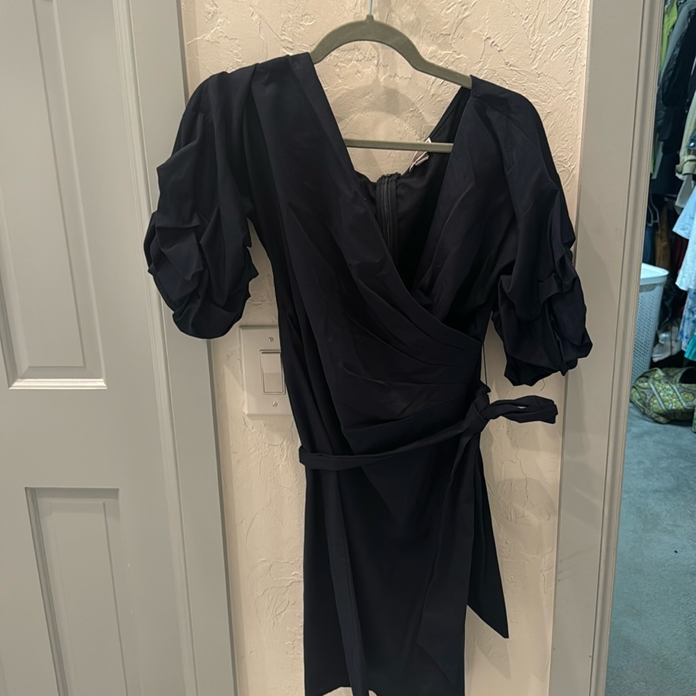 Navy dress, knee length.